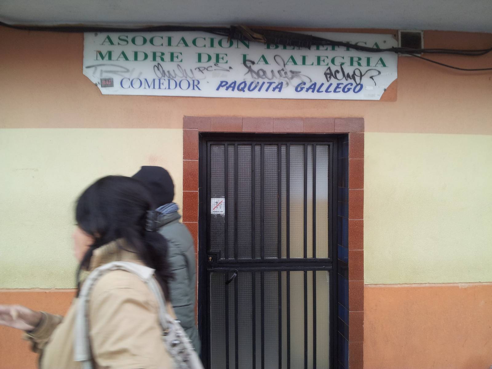 Entrada al comedor Paquita Gallego, regentado por la asociación «Madre de la Alegría» Entrada al comedor Paquita Gallego, regentado por la asociación «Madre de la Alegría»